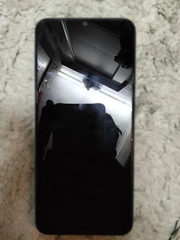 apple iphone 7: Oppo A18, 64 GB, rəng - Göy, Barmaq izi — 5