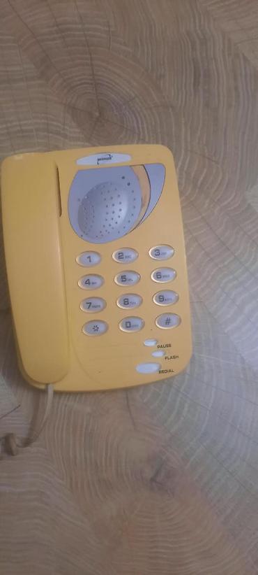 simli: Sarı rəngli stasionar masaüstü telefon Xüsusiyyətlər: - Rəng: sarı — 1