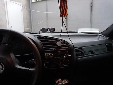 015 maşını: BMW 3 series: 1.6 l | 1993 il Sedan — 7