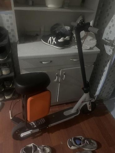 Электротранспорт: Elektrik skuter – oturacaqlı model - Praktik elektrik skuter, ön — 1