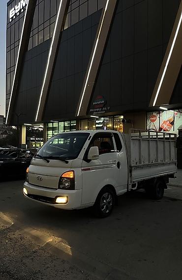 портер 2 2022: Hyundai Porter II — компактный городский грузовик с трехсторонней — 1