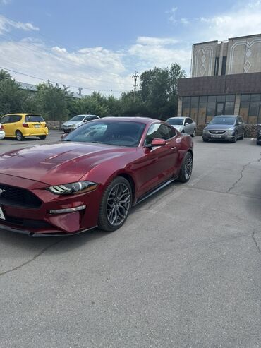 автомобиль нексия: Спортивное купе Ford Mustang бордового цвета с классическим силуэтом и