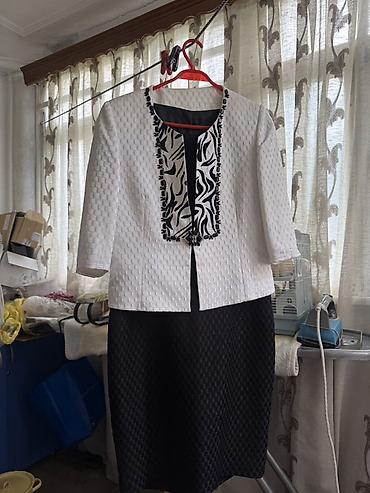 Qadın geyim dəstləri 1) Qara paltar + ağ qısa jaket - Paltar: qara