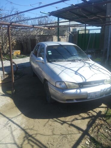 lada niva çadır: Kia Avella: 1.5 l | 1997 il Sedan