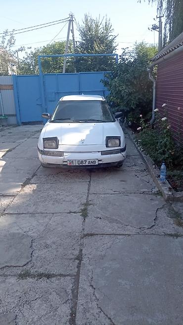 Транспорт: Mazda 323: 1990 г., 1.6 л, Механика, Бензин, Хэтчбэк — 2