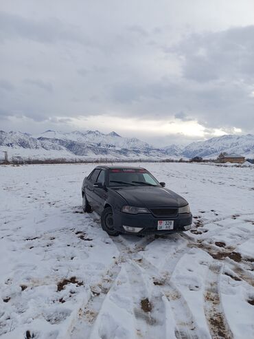 Другие автомобили: Седан чёрного цвета с тонированными стёклами. Киргизская регистрация — 4