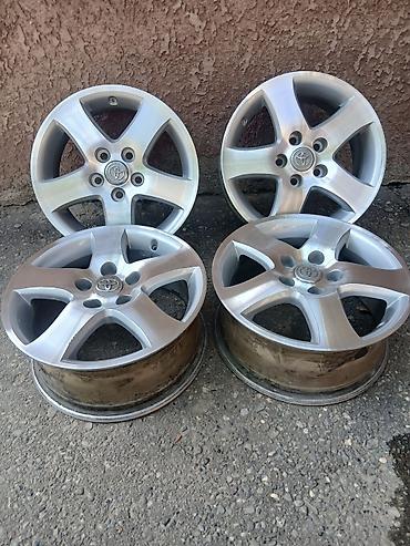 s 221: Комплект оригинальных литых дисков Toyota (4 шт.) - Диаметр: 16" - — 3