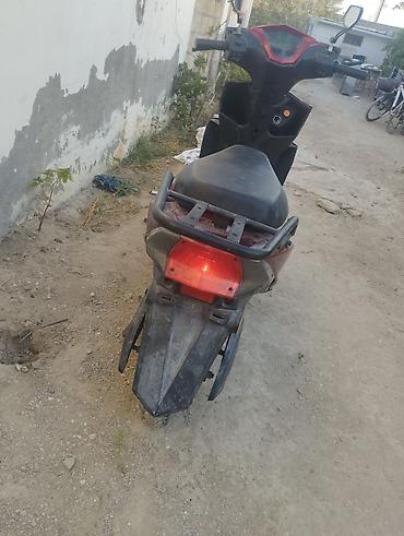 elektrikli moped icaresi: Moped qeza olunub qabag plasmaslari ezilib yanlari cizilib ama tok — 3