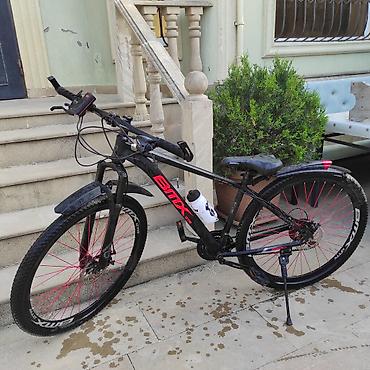 Dağ velosipedləri: BİMX pro markalı dağ tipli velosiped. Qara rəngli gövdəyə qırmızı — 3