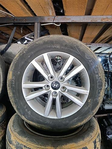 запаска соната: Литой колесный диск Hyundai с шиной Hankook - Оригинальный литой диск — 1