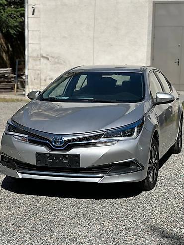 Toyota Corolla: 2019 г., 1.8 л, Автомат, Электромобиль, Седан