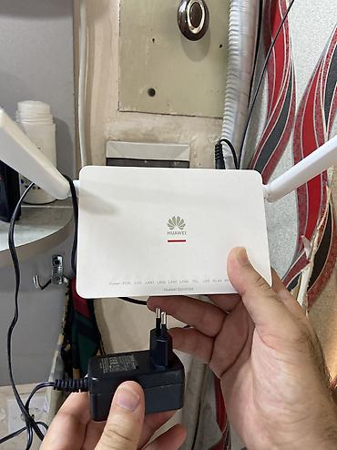 wifi adlari azeri: Huawei OptiXstar Wi‑Fi router/modem - İki antenli güclü Wi‑Fi siqnalı — 2