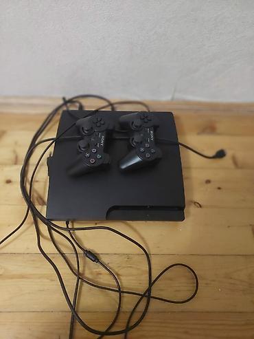 ps 3 cd: Sony PlayStation 3 Slim oyun konsolu - Model: PS3 Slim (qara rəng) - — 1