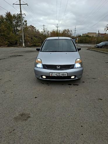 124 салон: Honda Stream: 2002 г., 2 л, Автомат, Бензин, Минивэн — 2