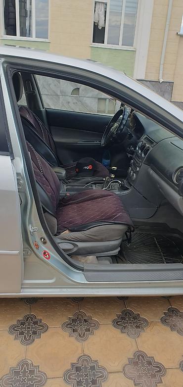 q7 audi: Mazda 6: 2002 г., 2 л, Механика, Бензин, Седан — 5