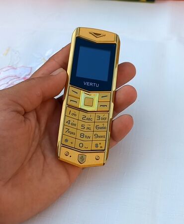 Elektronika: Vertu M9 2 nomre qeydiyat olunub reng gedmir ses yazmasi var kamera