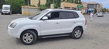 suzuki grand vitara: Hyundai Tucson: 2 l | 2006 il Ofrouder/SUV — 2
