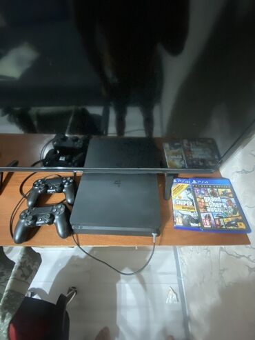 купить диски сони плейстейшен 3: Игровая консоль Sony PlayStation 4 Slim в черном цвете. Модель