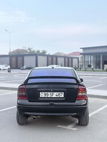 Opel: Model: Opel Astra G Coupe (3 qapı) Rəng: qara Kuzov: hetçbek/kupeli 3 — 9