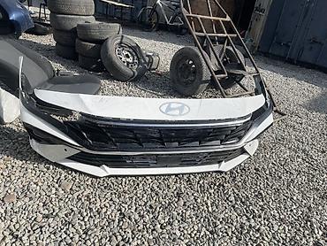 Передний бампер в сборе для Hyundai (логотип на центральной панели)