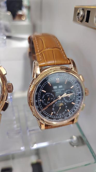 saat omega: Patek Philippe Geneve kişi qol saatı – klassik üslubda, çoxfunksiyalı — 8