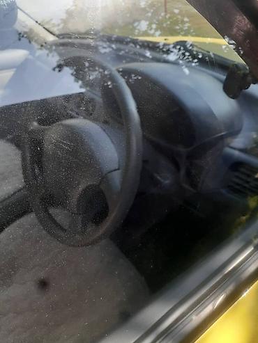 mazda 323 f: Nissan March: 2002 г., 1.1 л, Автомат, Бензин, Хэтчбэк — 6