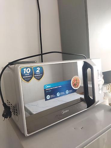 Микроволновая печь Midea 20M7007. Характеристики и особенности: -
