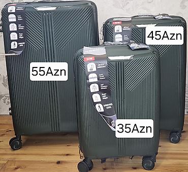camadan tekerli: Təkərli sərt korpuslu çamadan dəsti – tünd yaşıl rəng - Material — 1