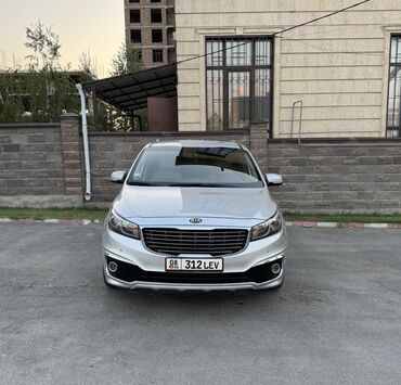 кия карнивал ош: Минивэн Kia Carnival серебристого цвета с характерной решеткой