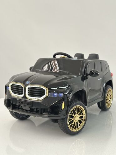 Uşaq üçün elektrik maşınları: BMW XM-1688 uşaq elektrik avtomobili. Qara, ağ və qırmızı rənglərdə