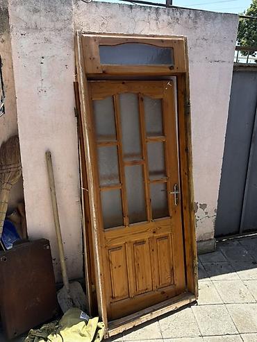 qapi ve pencere: 2 ədəd Taxta giriş qapısı və üst transom şüşəsi ilə - Material: təbii — 1