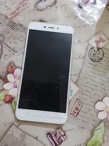 isdenmis telefonlar: Redmi 4A, 16 GB, rəng - Qızılı, İki sim kartlı — 1