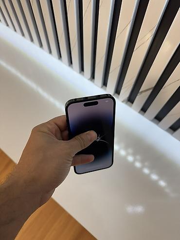 Apple iPhone: IPhone 14 Pro, Qara — 9