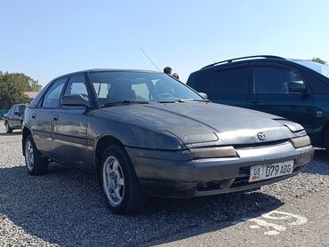 купить верблюжье одеяло: Mazda 323: 1993 г., 1.6 л, Механика, Бензин, Хэтчбэк