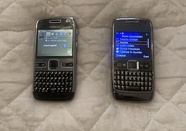 noki: Nokia E‑seriyası qwerty klaviaturalı 2 telefon dəsti Model — 1