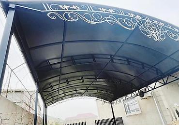 dam demiri: Metal konstruksiyalı, zövqlü naxışlarla bəzədilmiş böyük ölçülü giriş — 1