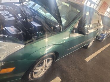 Ford: Ford Focus: 2 l | 2000 il 125235 km Sedan — 5