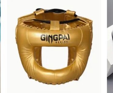 bədii gimnastika üçün kupalniklər: Gingpai brendinin qızılı rəngdə boks başlığı. Başlığı tam qoruyan