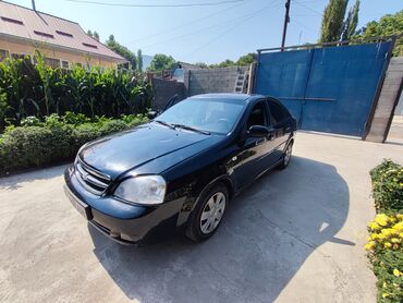 фара опель вектра б: Черный седан Chevrolet Lacetti. Этот автомобиль оборудован бензиновым