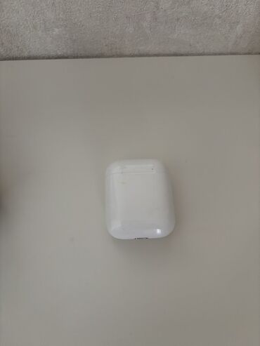 Зарядные устройства: Беспроводное зарядное устройство Apple