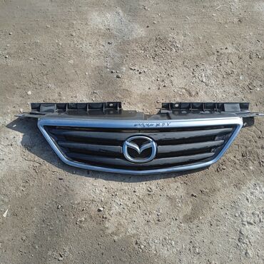Решетки радиатора: Решетка радиатора Mazda Б/у — 24
