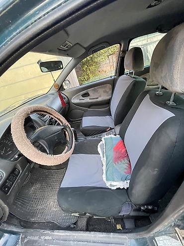 панель камри 35: Mitsubishi Carisma: 1997 г., 1.8 л, Автомат, Бензин, Седан — 6