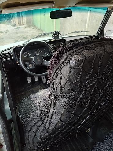 vaz panel: LADA 2107, ağ rəng, sedan. Texniki xüsusiyyətlər: - Benzin mühərriki — 2
