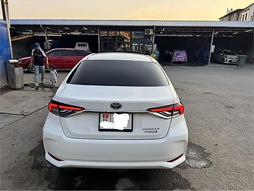 салон w124: Toyota Corolla: 2019 г., Гибрид, Седан — 3