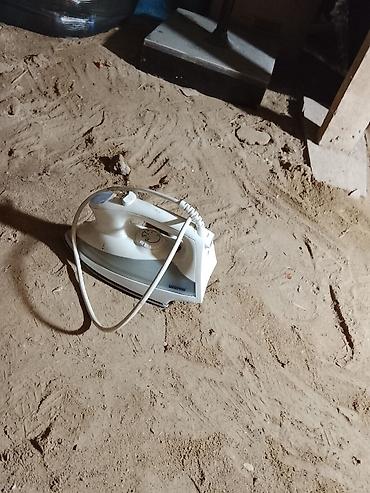 sonifer buxarlı ütü: Buxarlı ütü - Rəng: ağ - Material: metal altlıq və plastik korpus - — 1