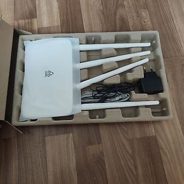Модемы и сетевое оборудование: Wi‑Fi маршрутизатор Tenda N300 (модель F6) - Скорость до 300 Мбит/с — 2