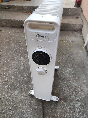 vintage frizider: Uljevi radijator Midea – prenosni grejač na struju - Tip: uljni — 2