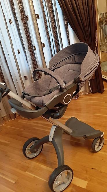 lulka: Stokke kolyaska, seliqeli islenib, iki dene başligi (lulka) var, biri — 4
