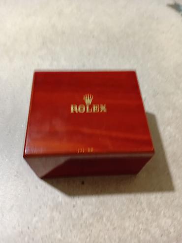 Принадлежности для часов: Məhsul: Rolex saat qutusu Təsvir: - Material: Parlaq cilalanmış ağac — 2