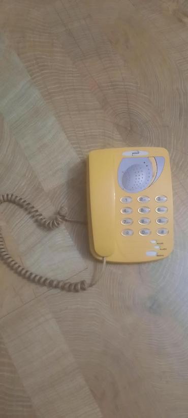 simli: Sarı rəngli stasionar masaüstü telefon Xüsusiyyətlər: - Rəng: sarı — 2